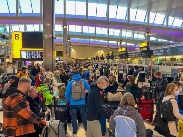 Chaotic check-in scene at Heathrow