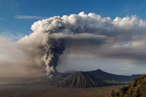 Ash cloud emerging from a volcano
