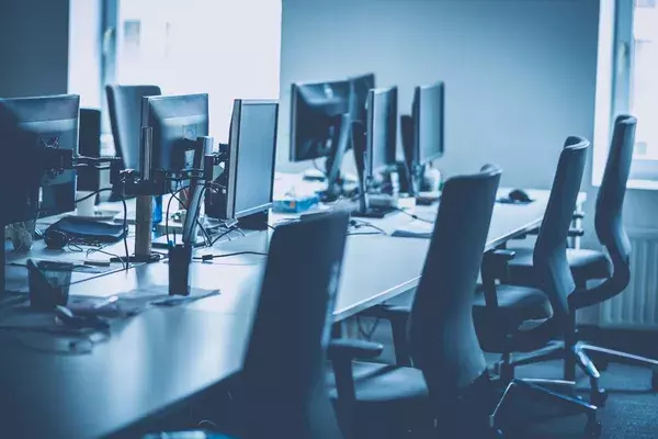 An office full of empty chairs