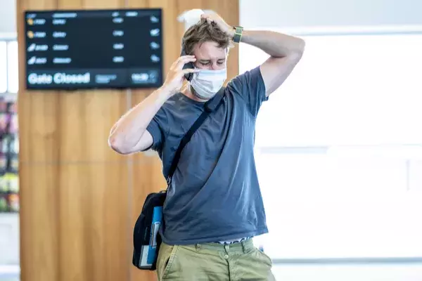 Stressed man in an airport 