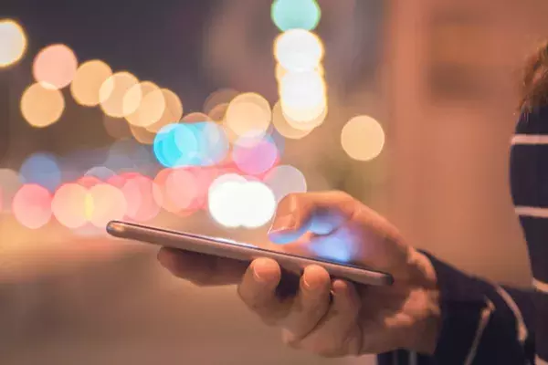 Hand holding mobile phone