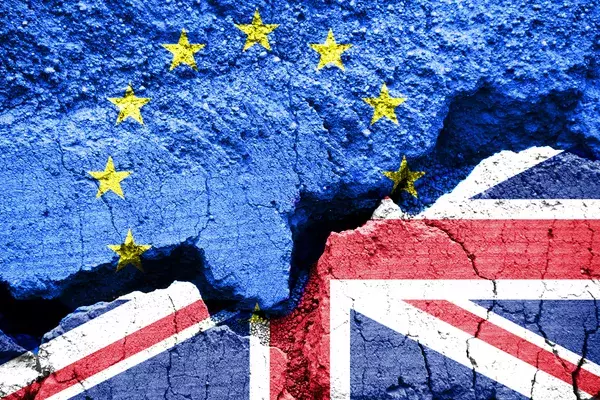 British and EU flags painted onto broken wall