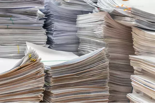Piles of paper forms
