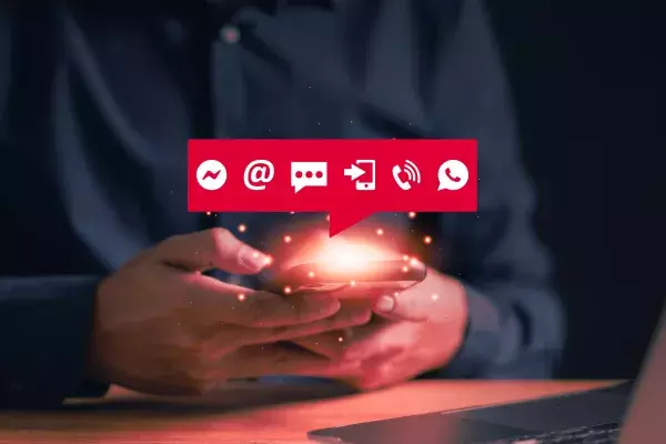 Man using phone with email and text icons