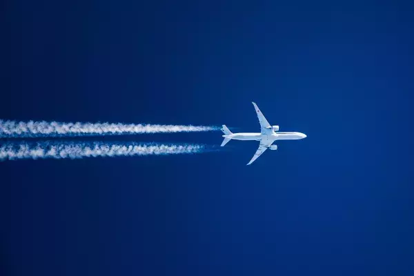 Plane flying through the sky